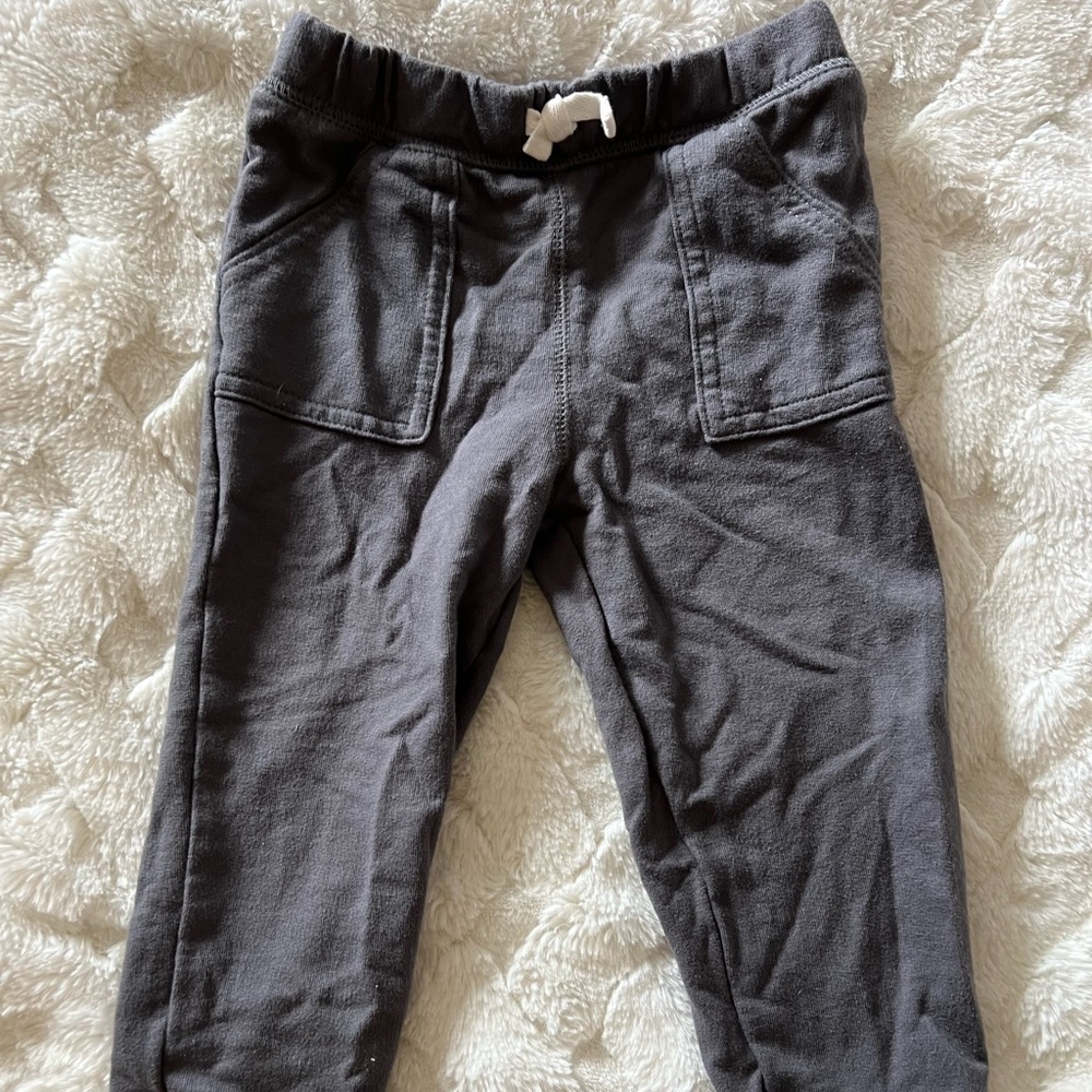 Carter’s gray sweatpants.